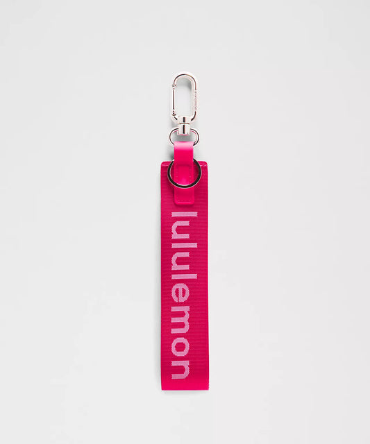 Lululemon Never Lost Keychain *Passionate/White